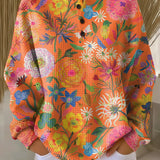 Isabel | Jersey naranja con flores